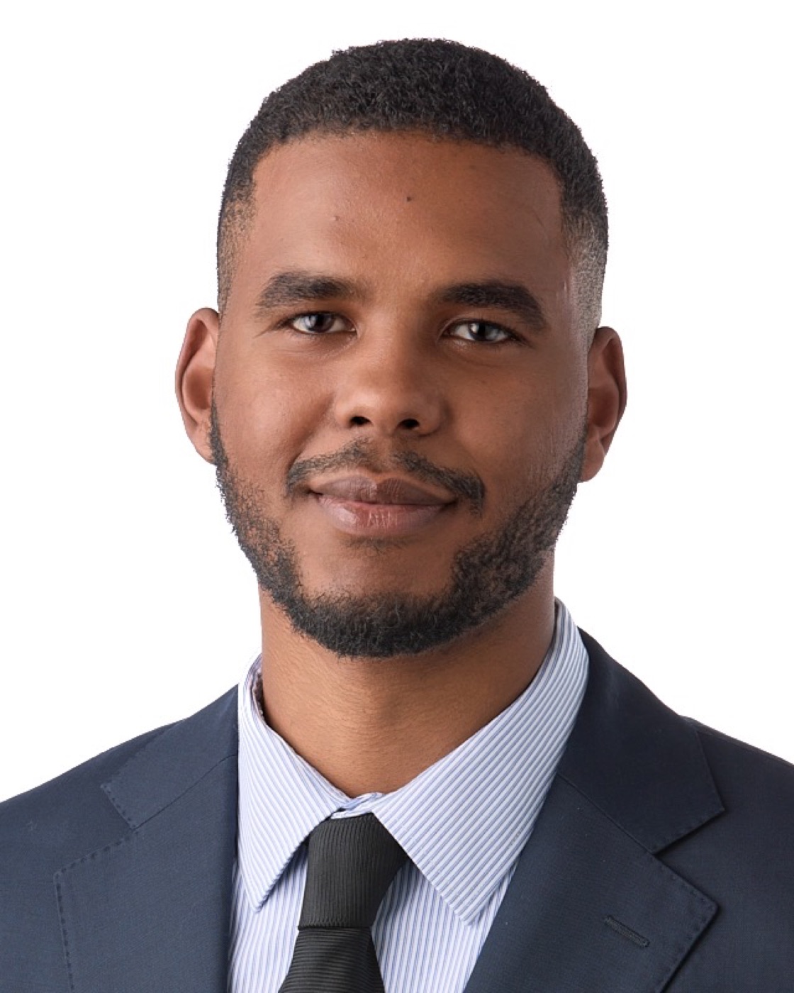 Corporate headshot of a man in a blazer, studio lighting